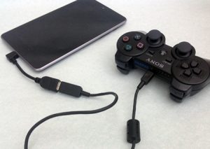Gaming controller connected with Android device using USB OTG.