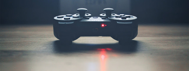 Wireless gamepad on a wooden platform